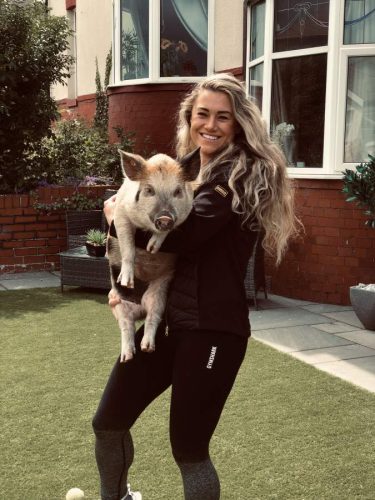 Wlbur the micro pig with owner Jane Sudds from Blackpool. See Animal News copy AN-CostPig: Thrifty Brits are choosing to keep their money in the PIGGY BANK by adopting a micro pig rather than a dog. With the cost of living crisis set to deepen in the Autumn, many people are looking at different cheaper ways to welcome a new pet into their lives. A recent study found that keeping a dog can cost up to £250 a month, and with the nation being forced to tighten its belt due to rising fuel and living costs, many feel priced out of new pet ownership entirely. WWW.ANIMALNEWSAGENCY.COM - 0044 (0)7494818329